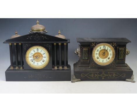 A late Victorian polished slate mantel clock of architectural outline, with three domes, to the pediment, having an 11.5cm Ro