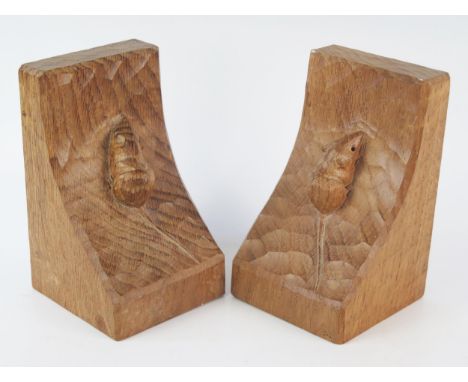 A pair of "Mouseman" chip carved pair of oak bookends, 15.5cm high. 