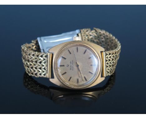 Bulova Accutron gent's wristwatch, with 33mm circular gilded dial, with plain batons and sweep second hand, on link strap (st