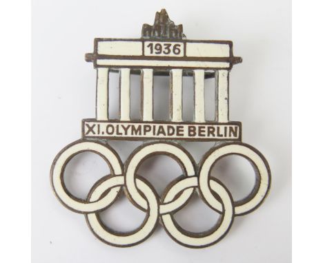 A Third Reich period 1936 Olympic Visitor's Badge, with enamel decoration, stamped to the reverse Paulmann &amp; Crone, Luden