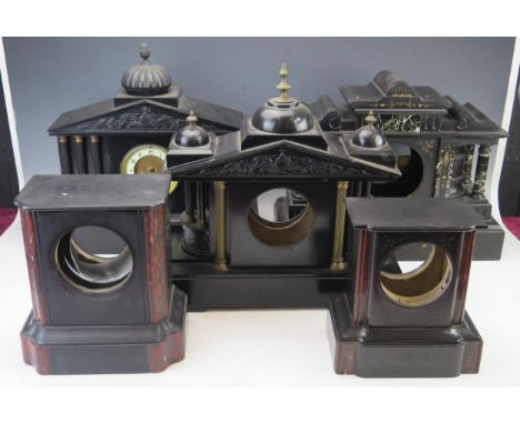Five assorted polished slate clock cases, various sizes. all incomplete. (4). 