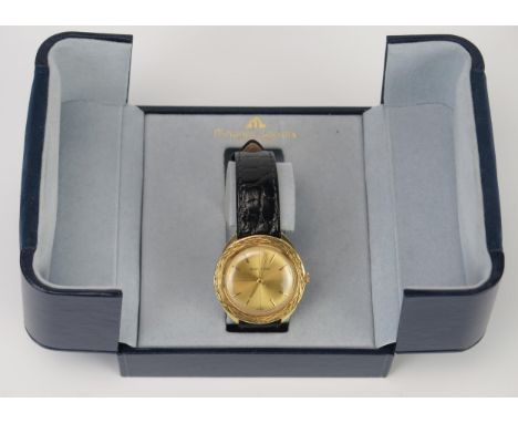 A Maurice Lacroix 18ct Gold Gent's Wristwatch, 34mm diam.,  manual wind and boxed. Running 