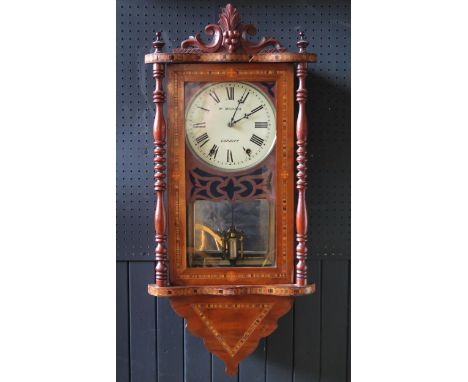 W Morris, Cardiff, a late Victorian mahogany and parquetry inlaid wall clock, with floral and scroll pediment, ring turned co