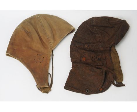 The 'Hegaro' brown leather flying helmet, bears makers label together with a similar leather motoring/flying helmet of a simi