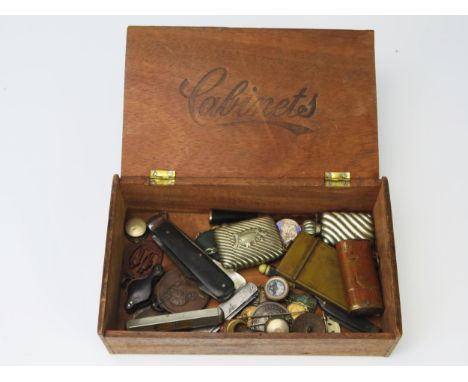 A box of assorted collectables; includes vesta cases, scent bottle, pen knives, compass, magnifying glass, medallions, MOD is