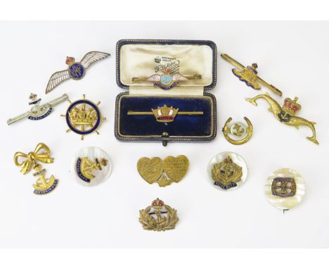 A collection of assorted gilt metal and enamel brooches, includes FAF, Royal Navy, and pothers. 
