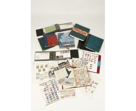 STAMPS, GREAT BRITAIN AND WORLD. A collection of First Day covers, stamps, and British Post Office mint stamps, in albums and