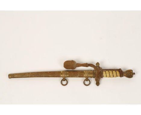 A SECOND WORLD WAR NAZI NAVAL OFFICERS DAGGER with engraved blade and original scabbard, 16.25"