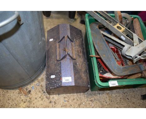 A cantilever vintage toolbox including tools