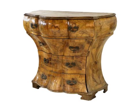 A 19th Century Italian or South German Figured Walnut and Crossbanded Bombé Shaped Commode, the moulded top above two short a