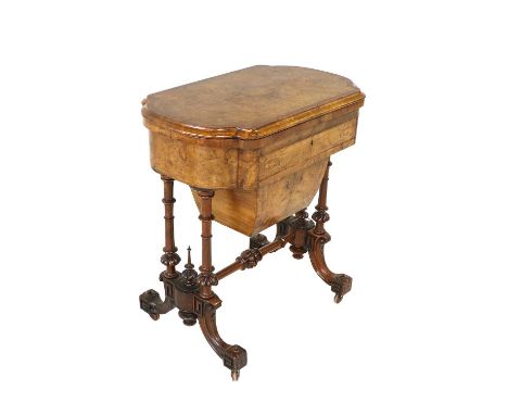 ~ A Victorian Figured Burr Walnut, Crossbanded and Marquetry-Inlaid Games/Work Table, circa 1870, the quarter-veneered moulde