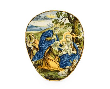 A Castelli Maiolica Plaque, probably Francesco Antonio Saverio Grue, circa 1730, of oval form, painted with the Adoration of 