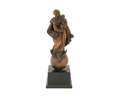 A Carved Boxwood Group of the Virgin and Child, probably Flemish, late 17th/18th century, she standing wearing a fur-lined cl