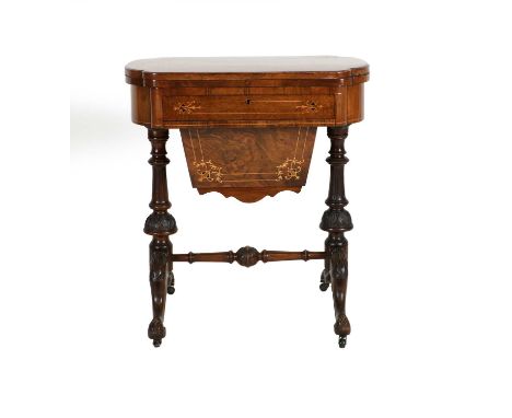 ~ A Victorian Figured Walnut and Marquetry-Inlaid Games/Work Table, circa 1870, the marquetry-strung top with hinged leaf enc