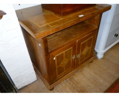 A good quality and decorative Flagstone side cabinet, the stone inlaid and crossbanded top above recess and two cupboard door