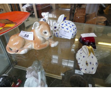 A mixed lot of assorted animals to include two Royal Crown Derby rabbit paperweight Royal Doulton flambe turtle and a Russian