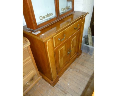 Modern hardwood sideboard/server, with single drawer above two cupboard doors, enclosing adjustable shelf.