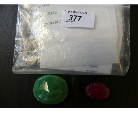 Two large gem specimens of a ruby and emerald.