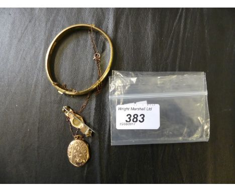 A yellow metal oval locket and chain, together with, a brooch and bangle (3)