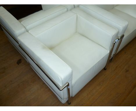 A modern Le Corbusier white single chair with chrome frame.AUCTIONEERS NOTE: THIS ITEM IS BRAND NEW AND LEATHER