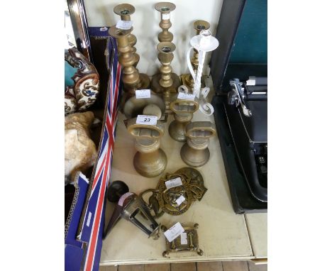 A mixed lot of 19th century and later metalware to include candlesticks, chamber stick, horse brass to include 'Our Monty', e