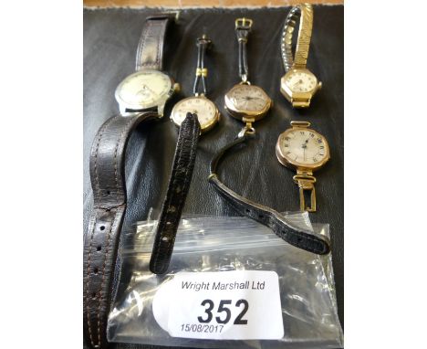 Four early 20th century ladies manual wind wristwatches, some AF, together with, a manual wind stainless steel Goupilles Angr