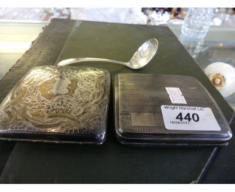 An Art Deco Birmingham hallmarked silver cigarette case together with a further cigarette case and silver-plated ladle 