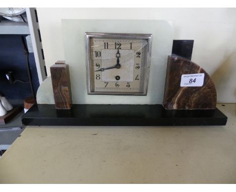 A good quality Art Deco marble and onyx mantel clock