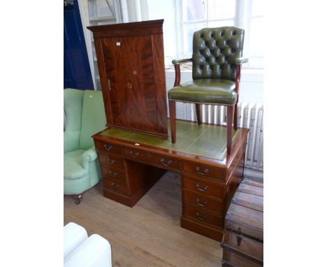 A good quality reproduction mahogany flat fronted kneehole desk, with green leather inset top, together with a green leather 