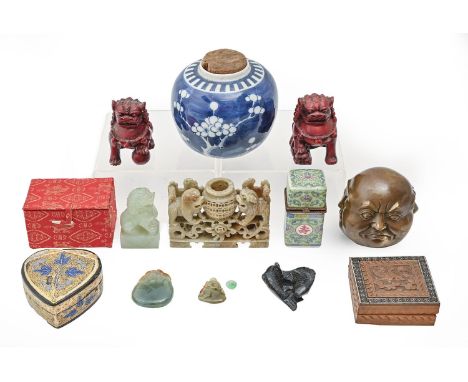 A quantity of Chinese and South East Asian works of art, including jade, soapstone and other carvings, a prunus and on-cracke