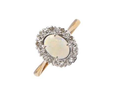 An opal and diamond ring,&nbsp;gold hoop marked 18ct PLAT, 1.6g, size O  Opal polish scratched