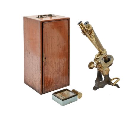 A brass and iron binocular microscope, Watson &amp; Son 313 High Holborn London 1031,&nbsp;with accessories in fitted case wi