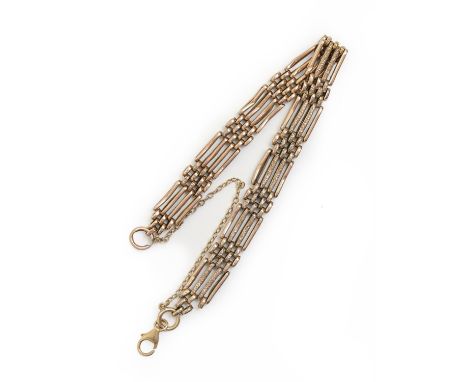 A gold gate bracelet,&nbsp; 19cm l, apparently unmarked 11.5g  Dented and creased in places
