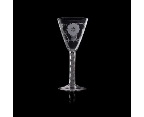 A LARGE 18TH-CENTURY JACOBITE WINE GLASS the deep conical bowl boldly engraved with displayed rose head flanked by open and c