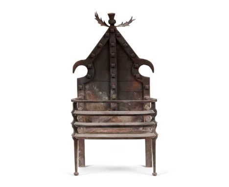 A VICTORIAN CAST IRON 'THISTLE' FIRE GRATE 19TH CENTURY the pointed fireback surmounted by a thistle, above a three bar grate