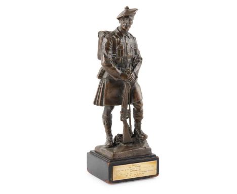 AFTER GEORGE HENRY PAULIN (1888-1962) SOLDIER OF THE 51ST HIGHLAND DIVISION  cast as a Highland soldier in full uniform, on a