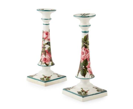 A PAIR OF WEMYSS WARE TALL CANDLESTICKS 'CABBAGE ROSES' PATTERN, CIRCA 1900 impressed WEMYSS WARE/ R. H. &amp; S., printed re