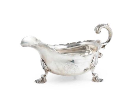 A GEORGE II SAUCE BOAT JAMES WELSH, EDINBURGH 1753 Assay Master Hugh Gordon, of slight baluster form with everted scalloped r