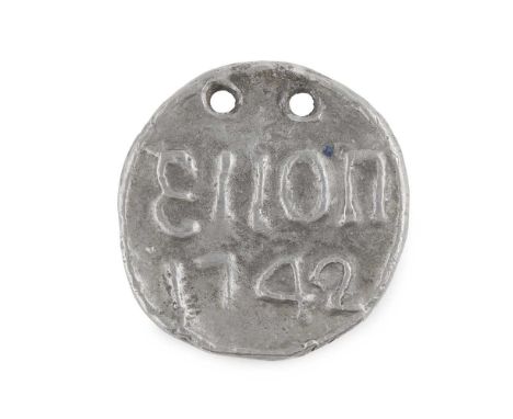 AN 18TH CENTURY ELLON BEGGAR'S BADGE of circular outline, obverse reads ELLON / 1742, reverse blank, with two suspension hole