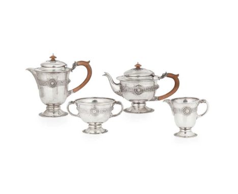 AN EDWARDIAN FOUR-PIECE TEA SERVICE  JAMES WEIR, GLASGOW 1908 comprising waterpot, teapot, twin handled sugar basin and milk 