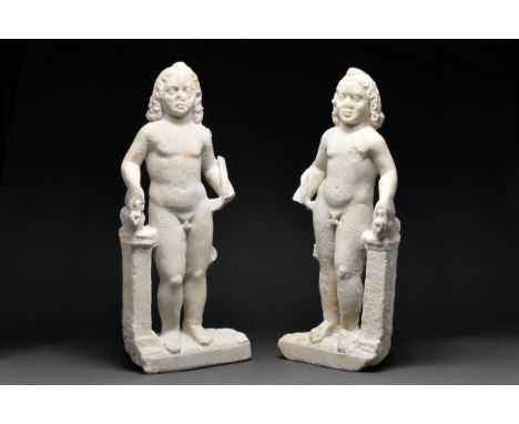 Ca. 200-300 AD A pair of beautiful, life-size marble statues of nude children representing Harpocrates, the god of silence an