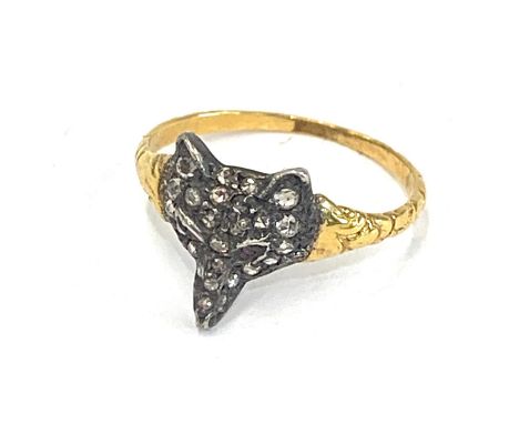 Rose diamond fox head ring ring has old cut rose diamonds and ruby eyes set in silver with gold ring please see images for de