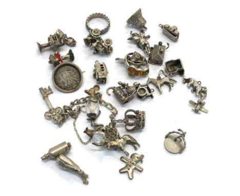 Selection of vintage silver charm bracelet charms weight 100g