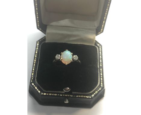 Opal and diamond ring