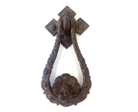 A Victorian cast iron door knocker 