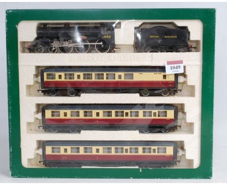 A Hornby R2044 train pack containing British Railways black class B17 engine and tender ''Liverpool'' would benefit from clea