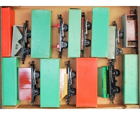 A large tray containing 8x Hornby postwar No. 50 boxed wagons including goods van, hopper, rotary tipper, side tipper, lumber