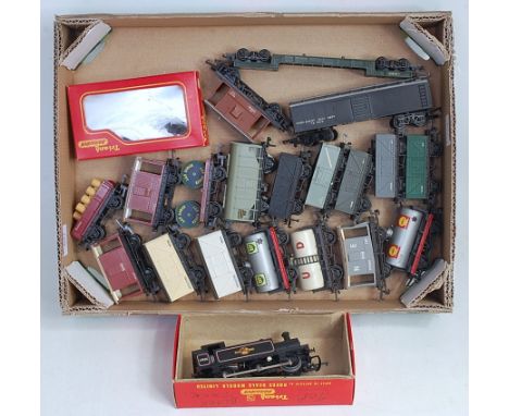 Tray containing 20 Triang goods wagons and a BR lined black Jinty tank engine (G)