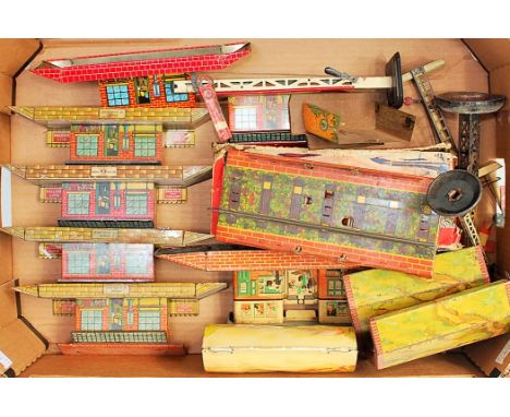 Two trays of assorted rolling stock and accessories by various British makers including Brimtoy, Mettoy and others, includes 
