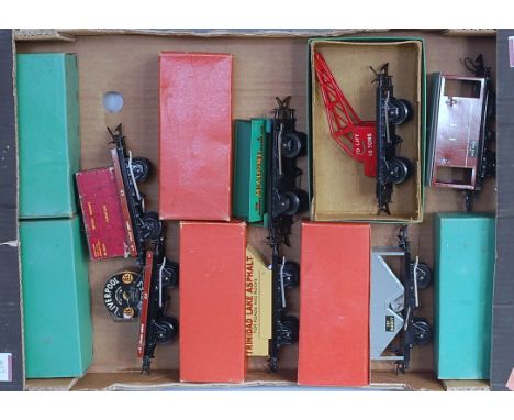 A large tray containing 7x Hornby postwar No. 50 boxed wagons including flat with cable drum, flat with furniture container, 